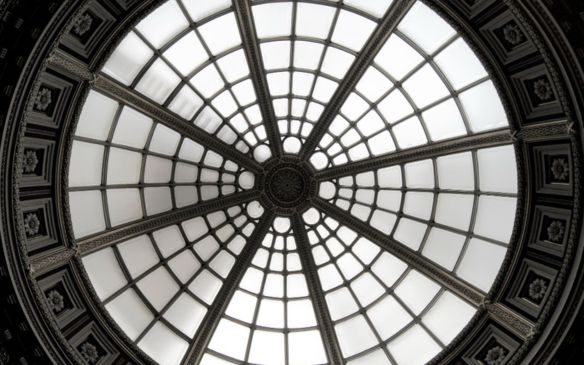 Golden ratio-inspired interior design showcasing a building's dome with a circular window.